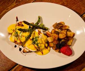 Eggs Benedict made from scratch with roasted asparagus