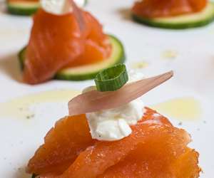 Gravlax on a cucumber medallion with creme fraiche