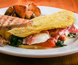 Italian omelet with home fries and toast